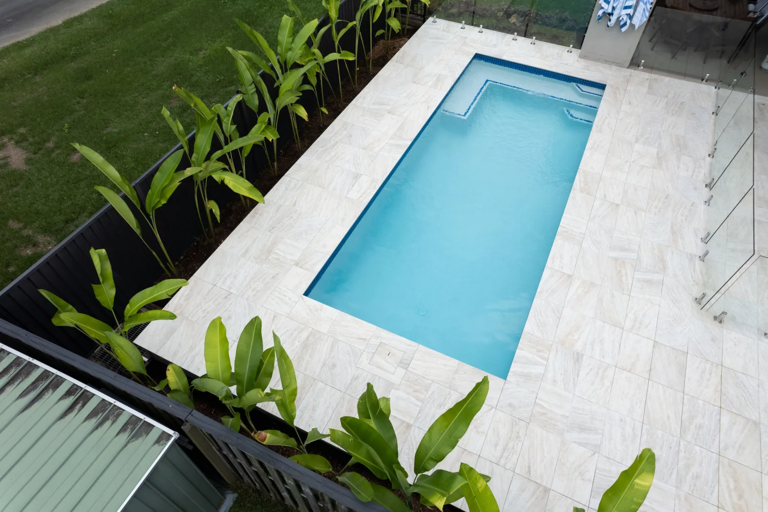 Aerial view of custom pool and travertine surround, Ferny Hills