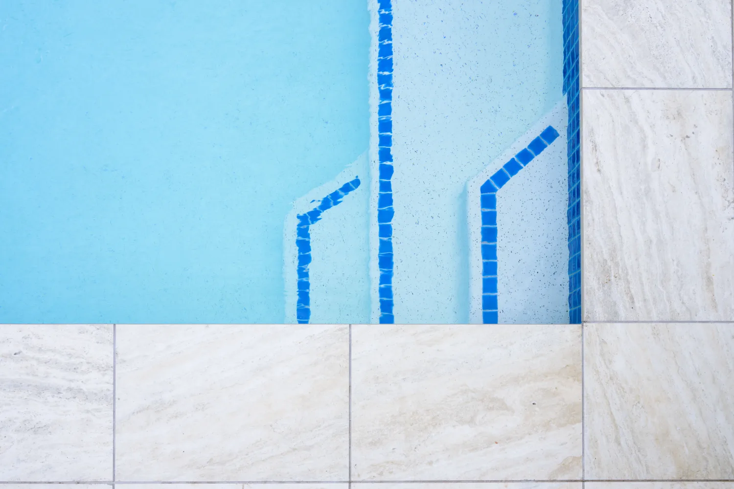 New waterline tiles and coping detail