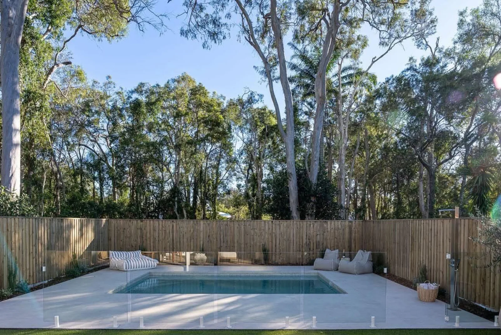 Custom pool framed by native gums and gardens, Ormiston