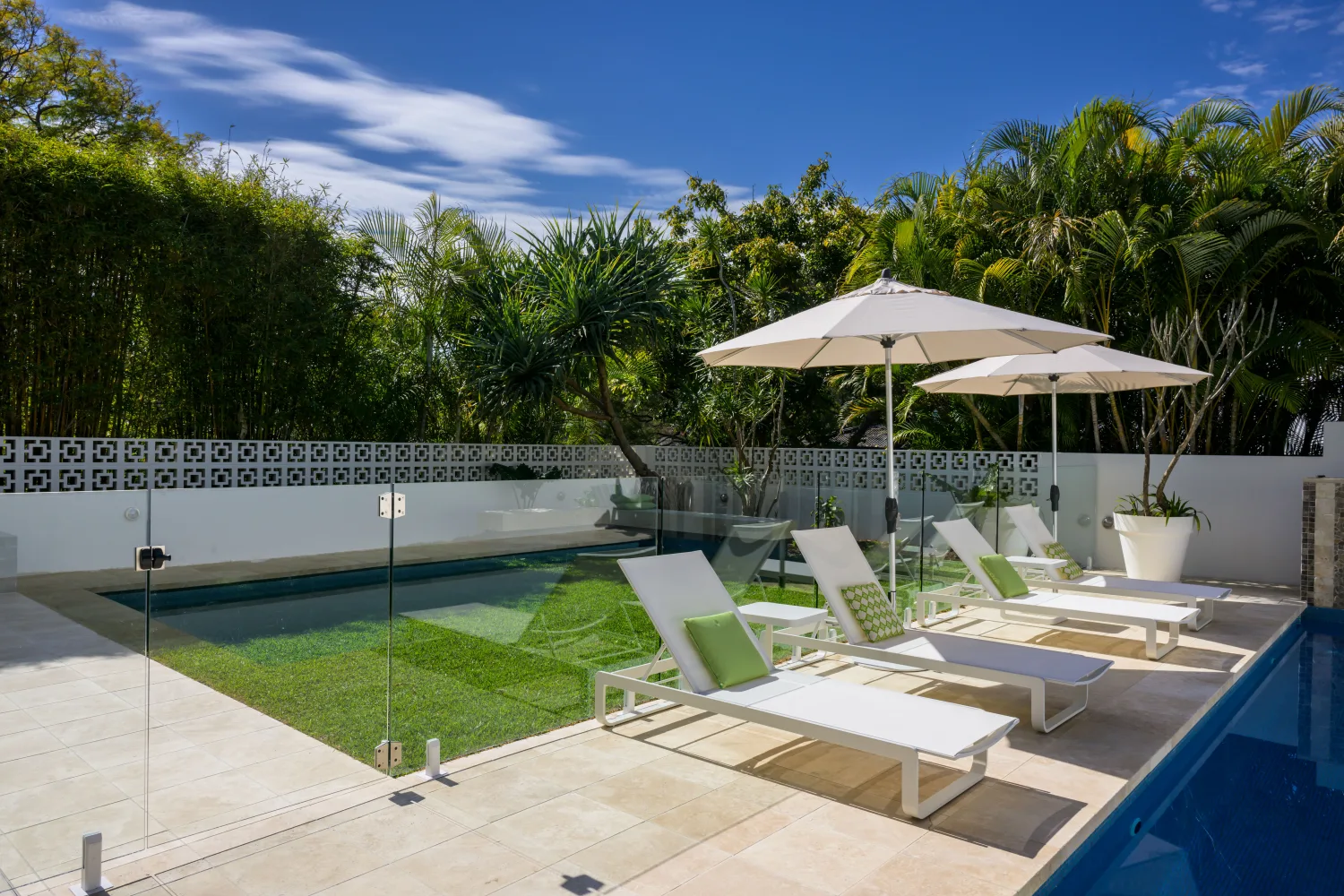 Custom pool with umbrella and sun lounges, Paddington