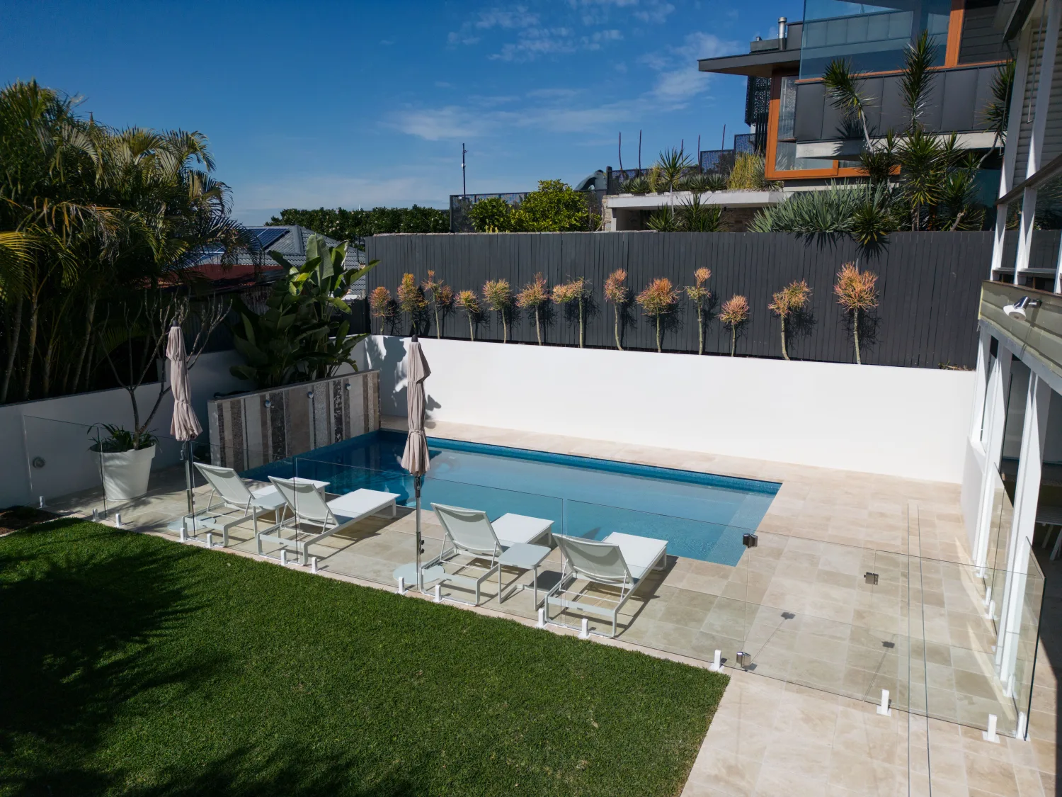 Custom pool with home and landscaping, Paddington