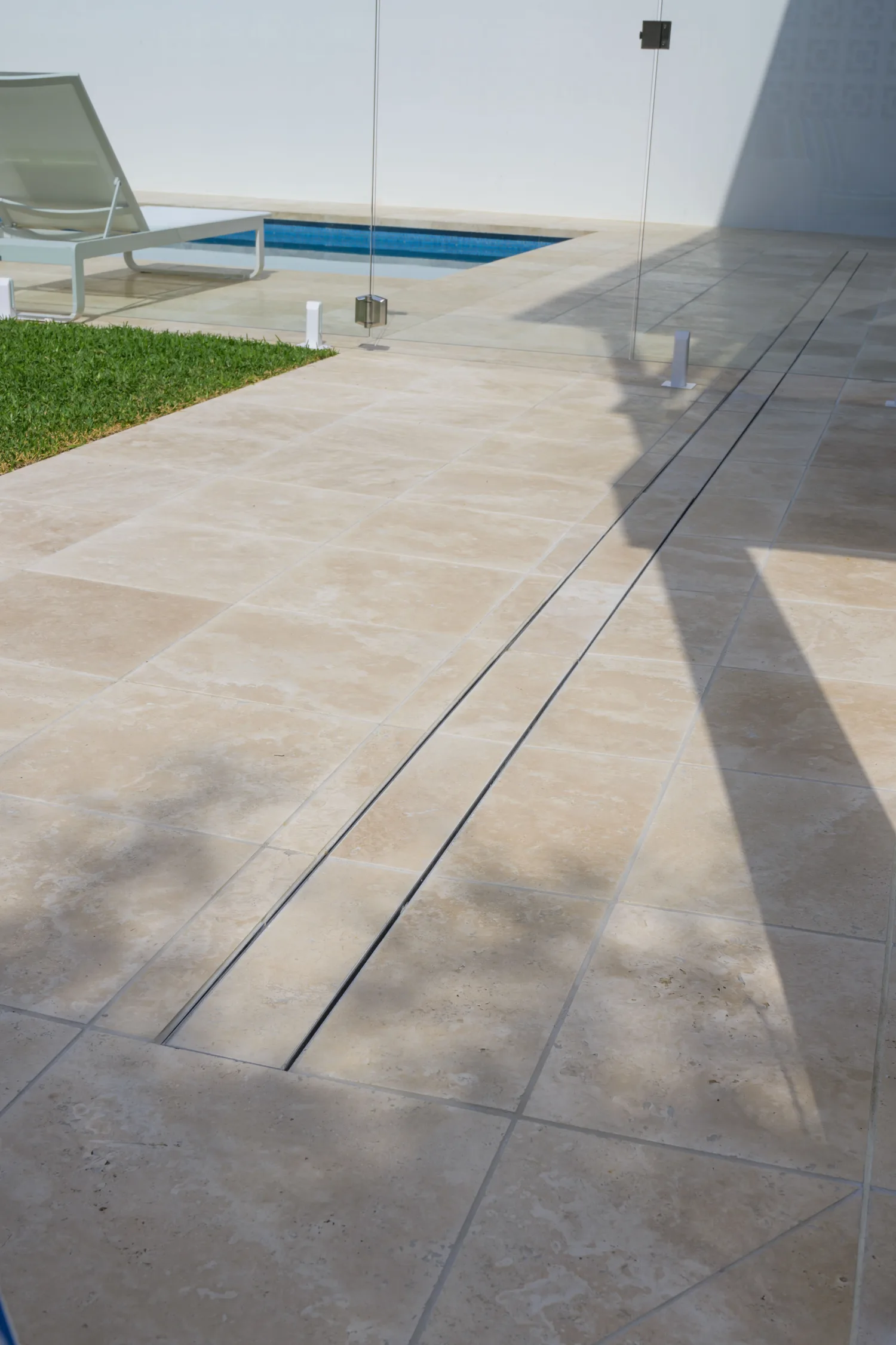 Poolside with travertine and glass fencing, Paddington