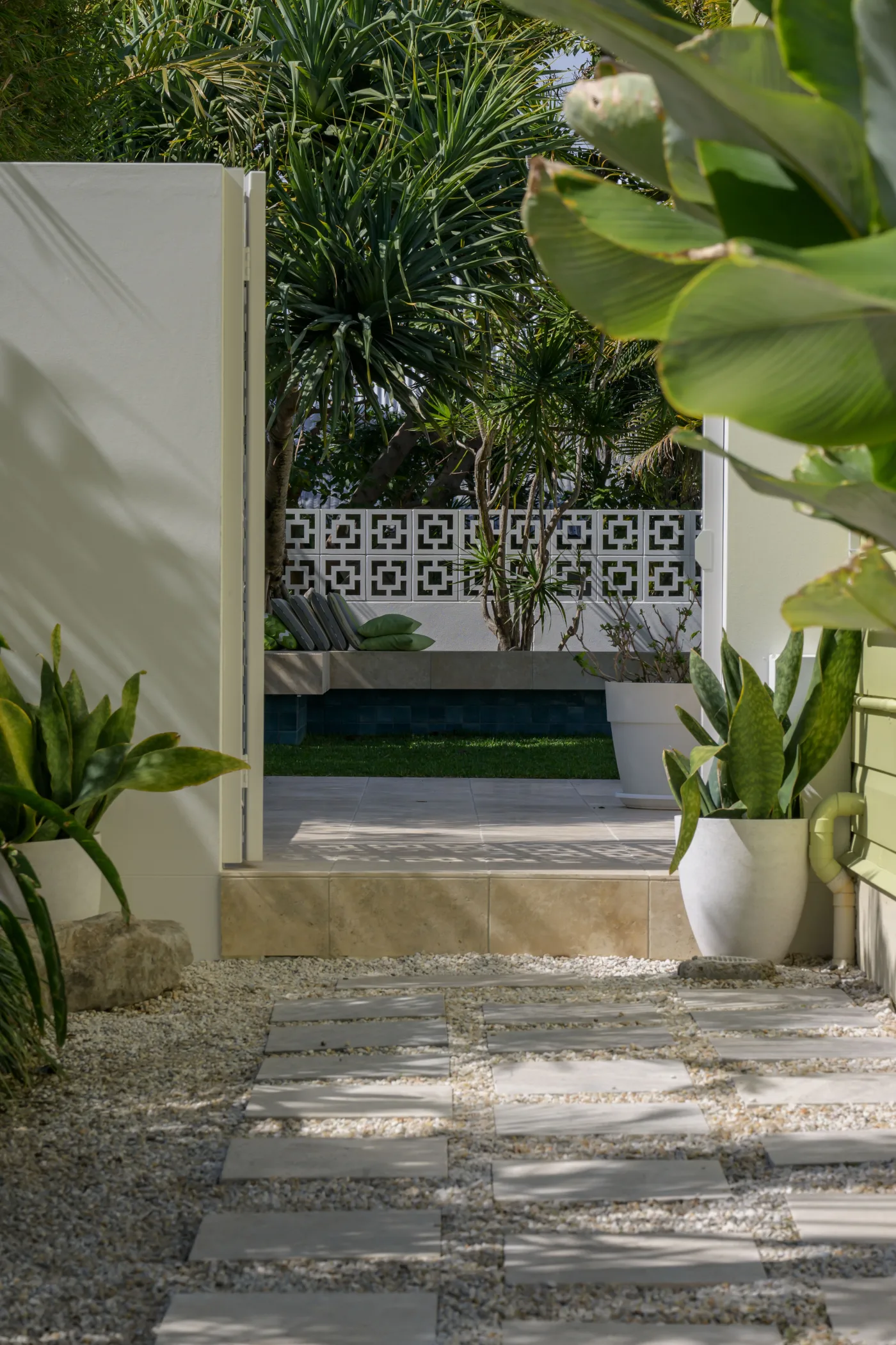 Breeze-block screen with potted planting, Paddington